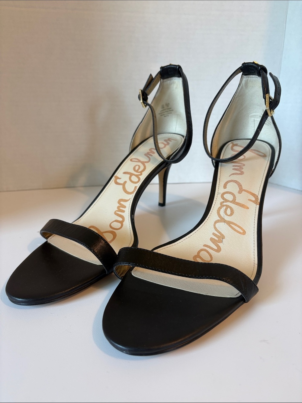 Sam Edelman Black Patti Ankle Strap Sandal w/ Gold Lettering and Stiletto heel